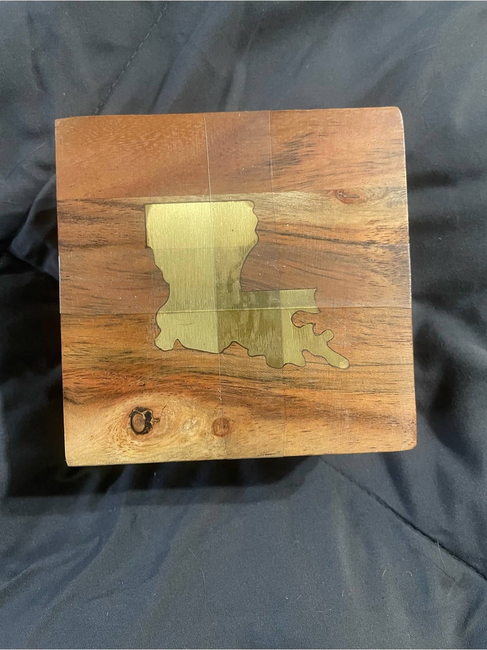BNWT set of 4 wooden footed coasters with Louisiana in gold.